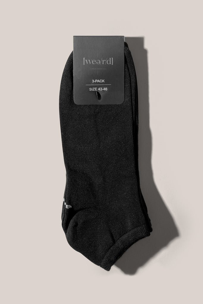 A pack of black low-cut socks made from eco-friendly bamboo material for ultimate comfort and durability